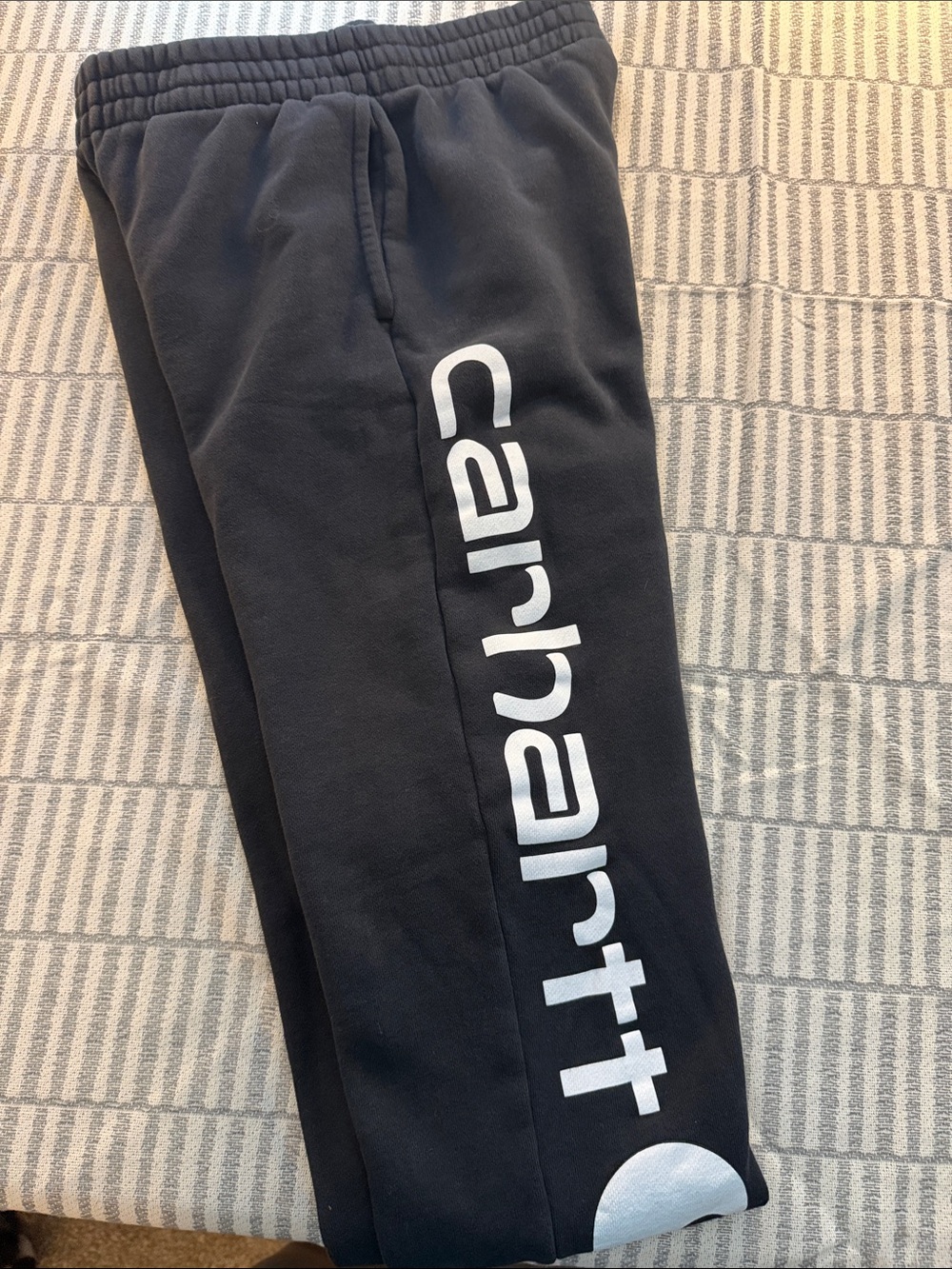 Boys Carhartt Black Joggers with White Vertical Logo 2 pockets and drawstring